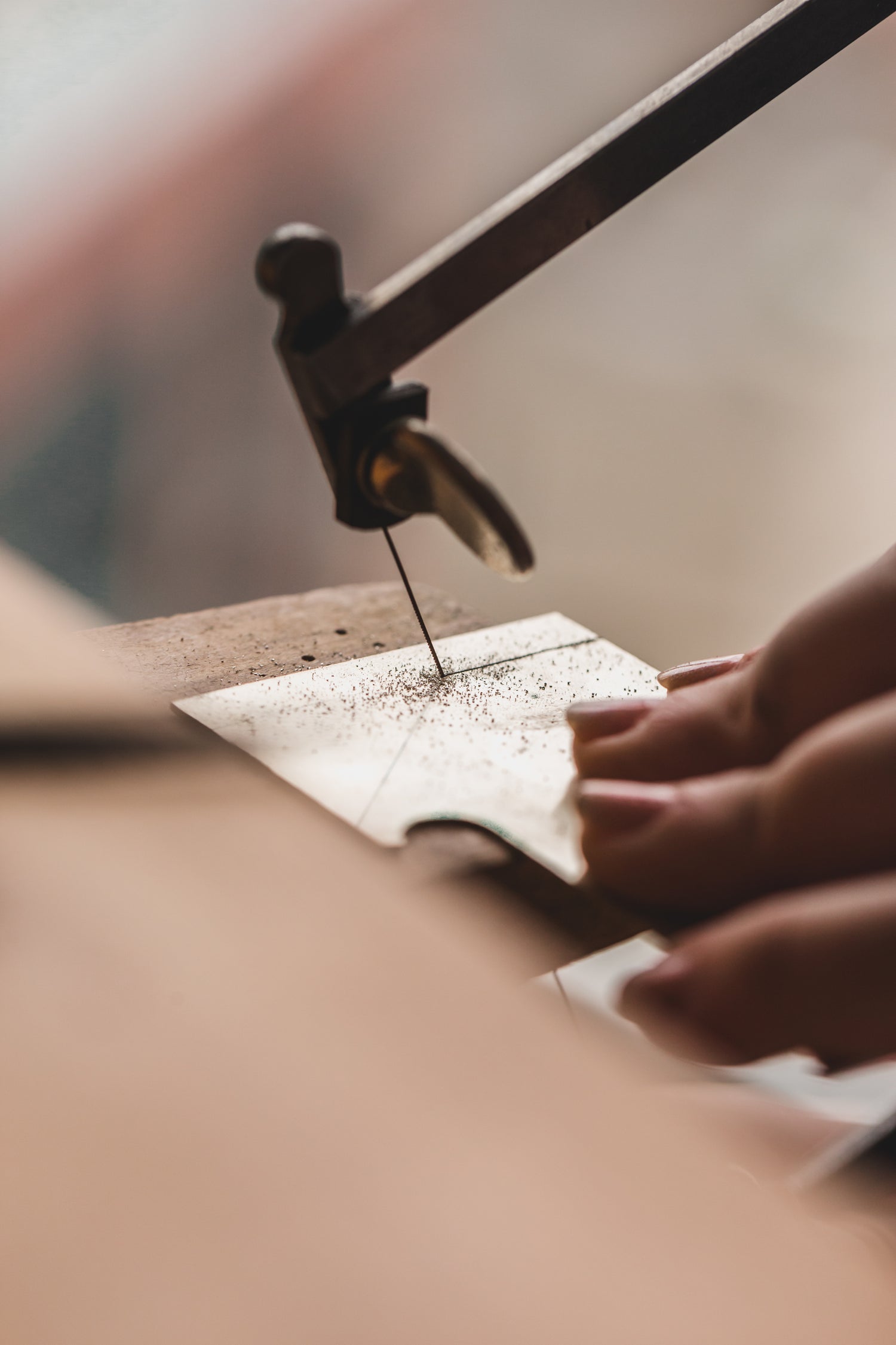 Hand sawing through metal