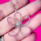 Hand holding Whimsical Bloom Silver Flower Pendant | Silverlicious Artisan Jewellery